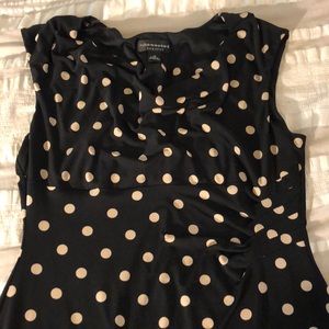 Black fitted dress with cream polka dots